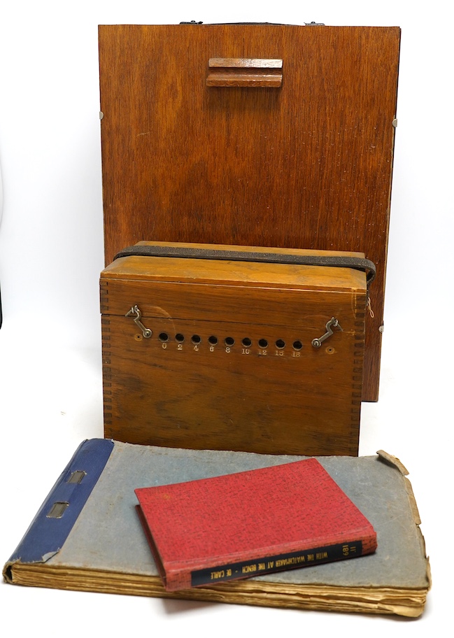 A collection of watch parts, tools and a small selection of costume jewellery, housed in two cases, together with two books. Condition - poor to fair